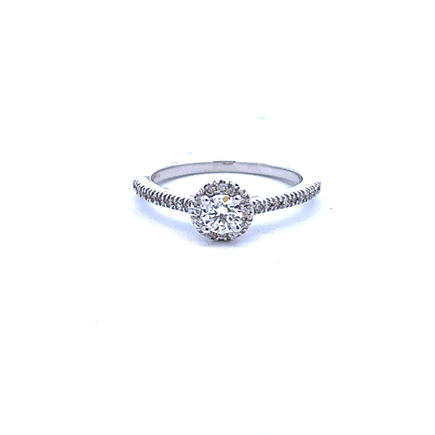 14Kt White Gold Engagement Ring with Round Center and halo of 12 Round Prong Set Diamonds and 18 Round Prong Set Diamonds down the Shoulder .53Ct TDW SI1 GHGoes with WB 110-1393