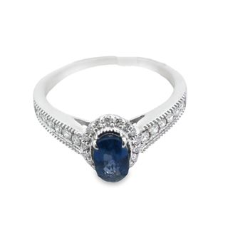 14kt White Gold Ring With Oval Sapphire .75ct and 30 Round Diamonds .2