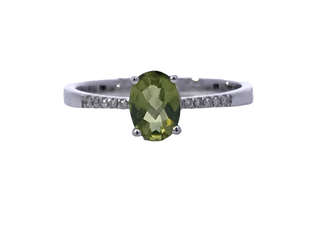 14kt White Gold Ring With 1 5X7 Peridot .91tw and 10 Round Diamonds .04tdw GH SI2