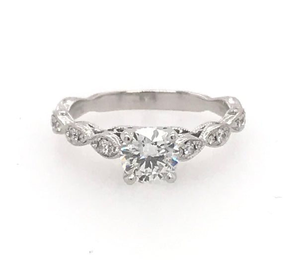 14kt White Gold Diamond Ring With 1 Round Brilliant Diamond = Approx .75ct, I1 I  18 Round Brilliant Cut Diamonds = Approx .15ct tdw, I1 HIRetail 3699  Estate 2499