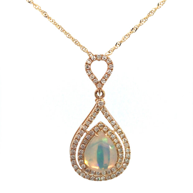 14Kt Yellow Gold Pendant With 1.21Ct Genuine Pear Shaped Opal And 76 R