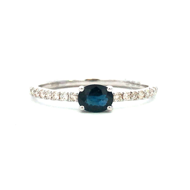 14Kt White Gold Ring With Oval Sapphire .44ct and 20 Round Diamomds .1