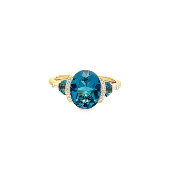 Lady's Yellow 14 Karat London Blue Topaz Three Stone Fashion Ring Size