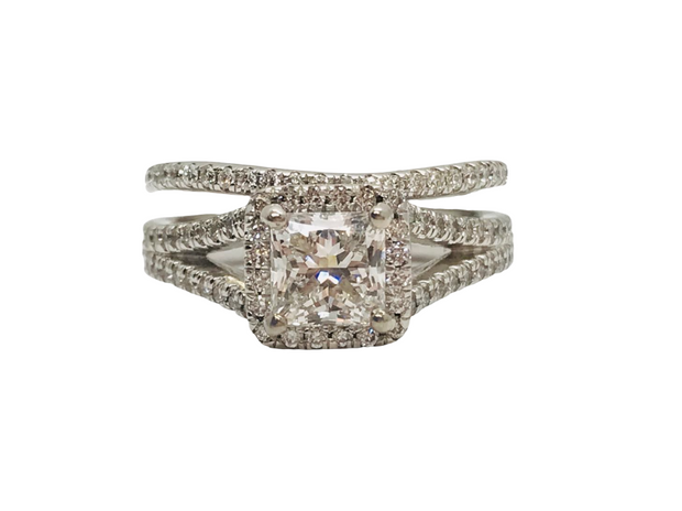 18kt White Gold Bridal Set With 106 Round Brilliant Cut Diamonds = Approx .53ct tdw, VS2 FG  1 Princess Cut Diamond = 1.01ct, VVS1 E  Laser Inscribed GIA 1196243646Retail 11999  Estate 7999