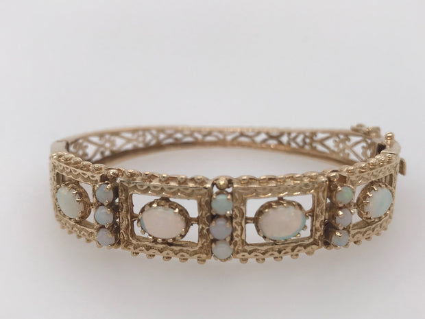 14Kt Yellow Gold Hinged Bangle Bracelet Weighing 27.2 Grams With 4 - 7
