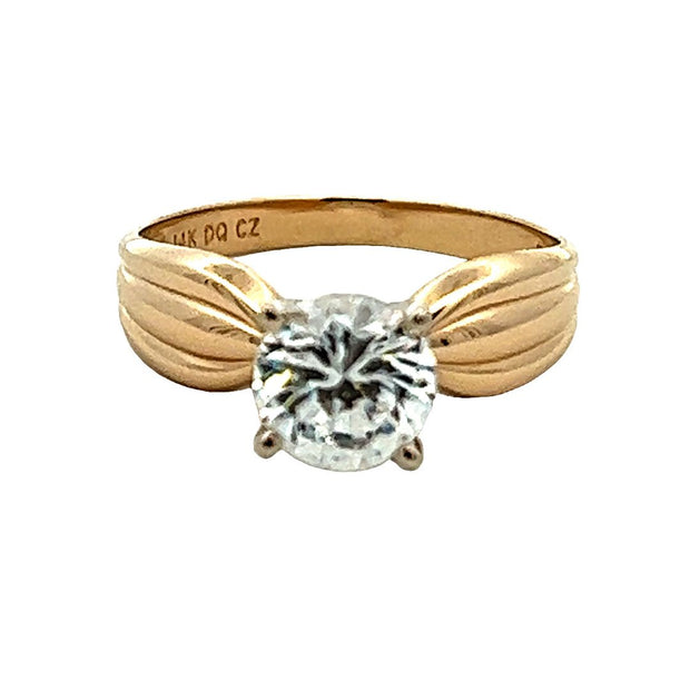 14 Karat Yellow Gold Ring Prong Set With One Round Cubic Zirconium Mea