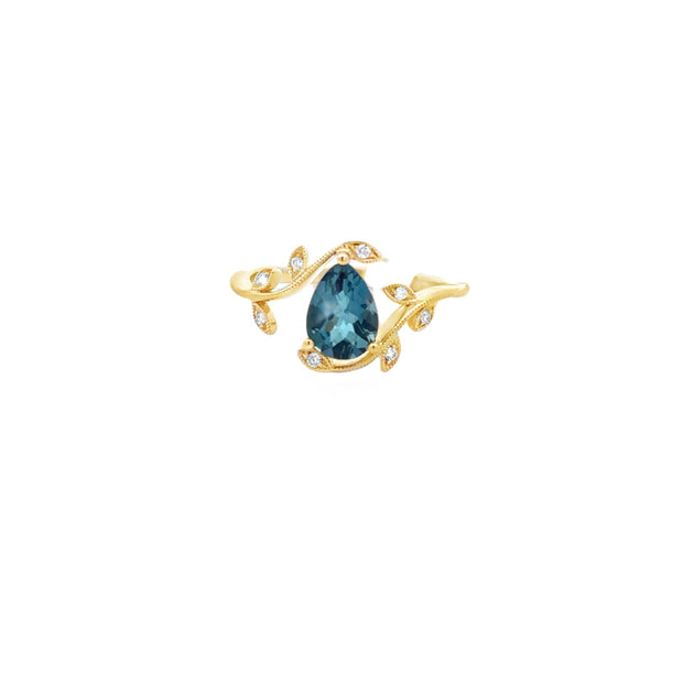 Lady's Yellow 14 Karat Blue Topaz Fashion Ring Size 7 With One = 1.20C