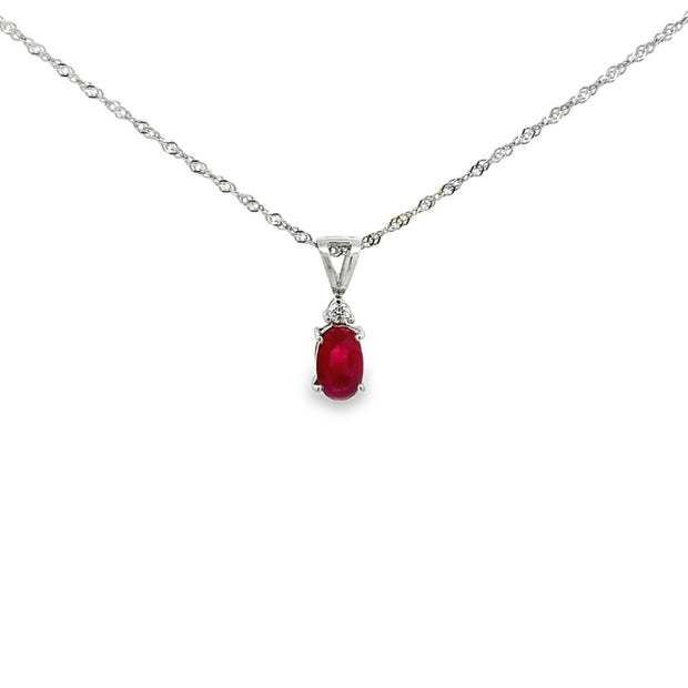 Lady's White 14 Karat Ruby Pendant Length 18 With One = 0.64Ct Oval Ru