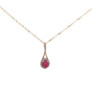 14kt Yellow Gold Pendant With Oval Ruby .38ct and 21 Round Diamonds .0