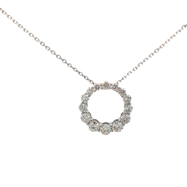 14kt White Gold Circle Pendant With 14 Round Diamonds .65tdw