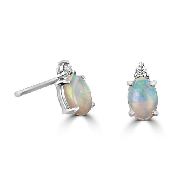 14kt White Gold 4x6 Oval Opal .50ct With One Diamond On Top Earrings .