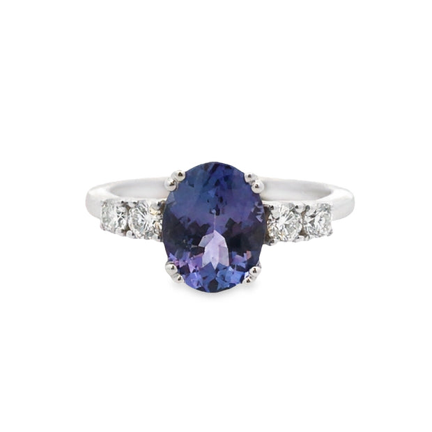 14kt White Gold Ring With Oval Tanzanite Center 1.90ct and 4 Round Dim