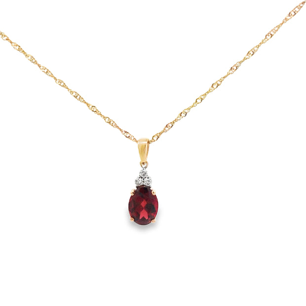 Yelow Gold Pendant With One 6x8 Oval Garnet At 1.70tcw And Three Round