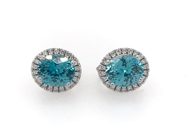 14kw White Gold Oval Blue Zircon 3.76tgw  with 44 Round Diamonds Halo .22tdw HI Si1 Earrings