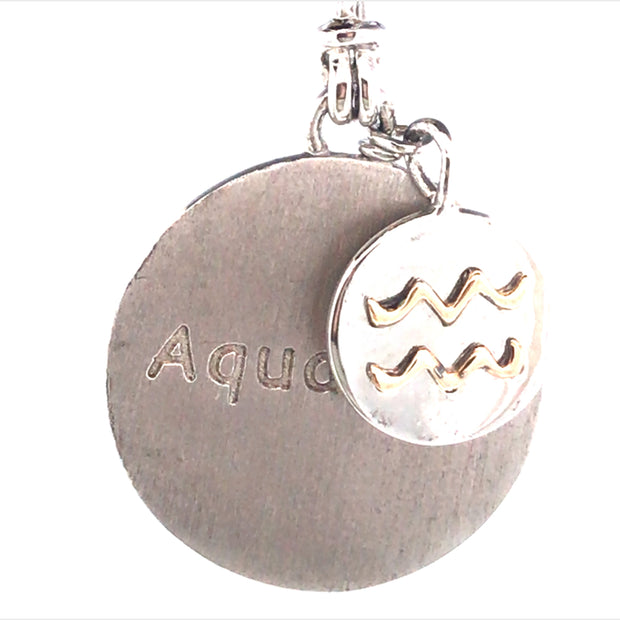 Sterling Silver Round Charm Aquarius With A Smaller Charm With An 18Kt Yellow Gold Zodiac Emblem