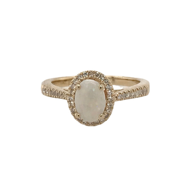 10Kt Yellow Gold Ring With 1 Center Opal Surrounded By Halo Of 18 Round Diamonds And 14 Round Diamonds Down The Shoulder  .12Ct Tdw I1 HI.