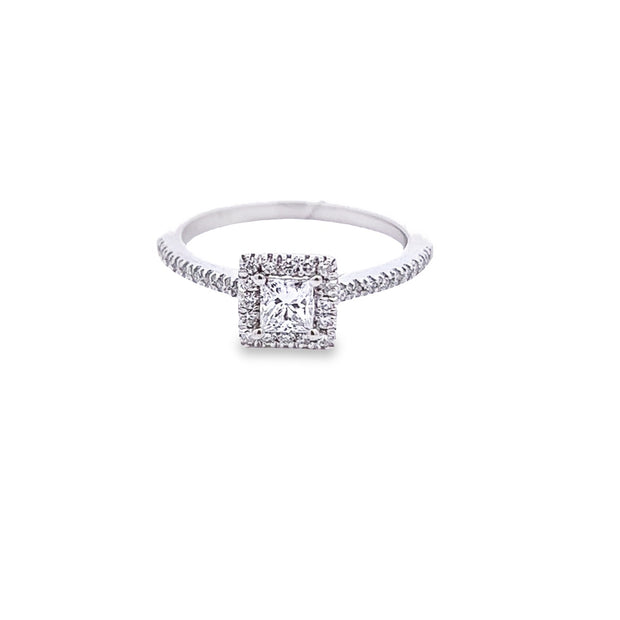 14Kt White Gold Engagement Ring with 16 Round Prong Set Diamonds in Halo surrounding 1 Princess cut Center Diamond and 18 Diamonds on the shoulder .56ct tdw SI1 GHGoes with WB 100-1390