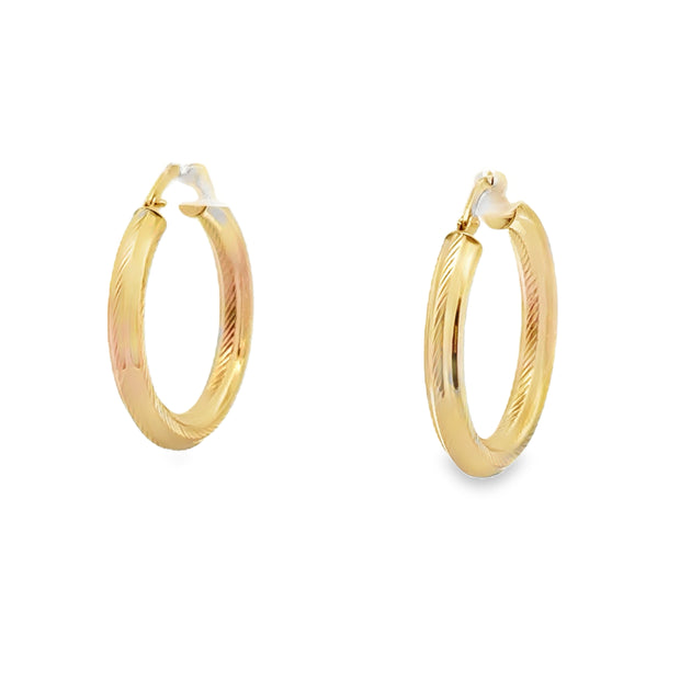 Vintage 14Kt Yellow Gold Diamond Cut Hoop Earrings Weighing 3.3 Grams.