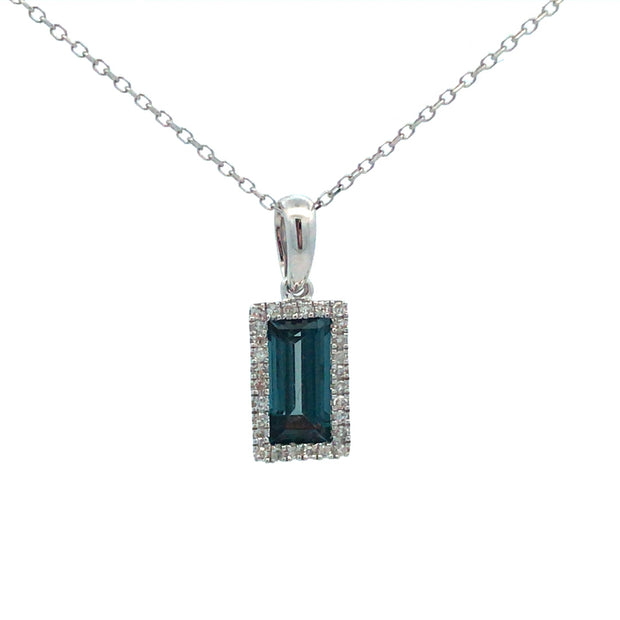 14Kt White Gold Pendant With One .77Ct Baguette London Blue Topaz And