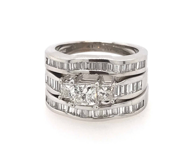 14Kt White Gold  Bridal Set With Center Princess Cut Diamond.51Ct Vs2 H And Two Princess Cut Diamonds On Either Side .38Ct Si1 H With Two Wedding Bands And Engagement Ring Containing 52 Baguette Diamonds 2.02Ct Vs2 GH