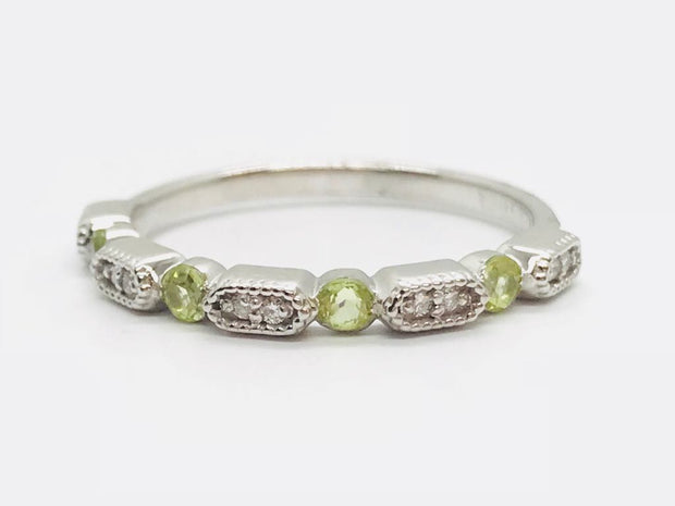 10Kt White Gold Stacker Band with 4 Round Prong Set Peridot .21ct TGW and 10 Round Prong Set Diamonds with Miligran .05ct TDW I1 HI